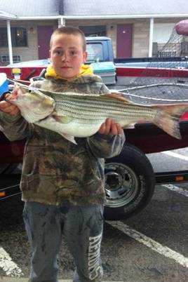 Cayden Keeler of Ripley with a huge striper fish! Great job!
