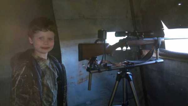 Gavin, 3 years old, set up in a deer blind with his Dad.