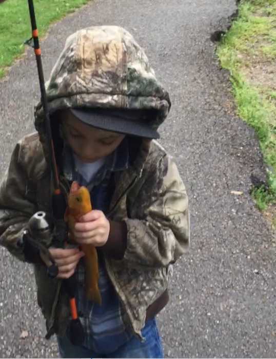 Kruz, 4 years old, caught this golden trout at Coonskin.